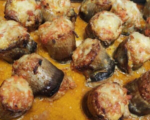 Рулетики из свежей сельди с овощами